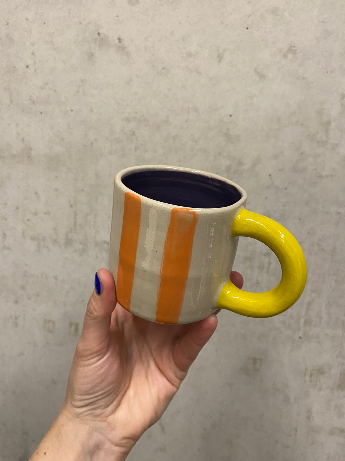 Keramiktasse  "Gutti" in orange/ gelb / lila